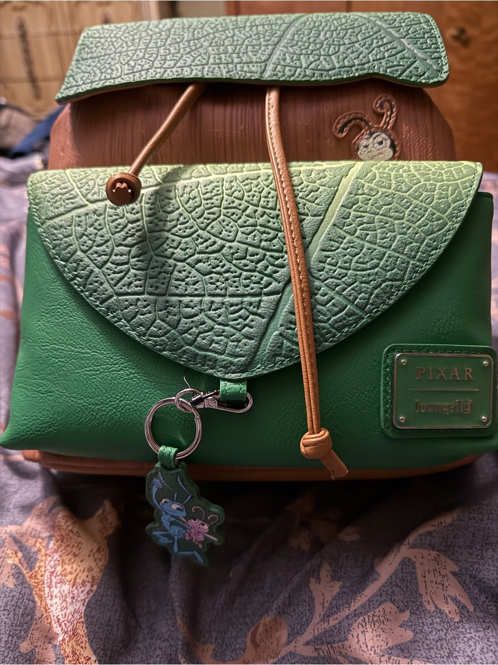 Loungefly A Bug’s Life Green Leaf Backpack with Brown Accents